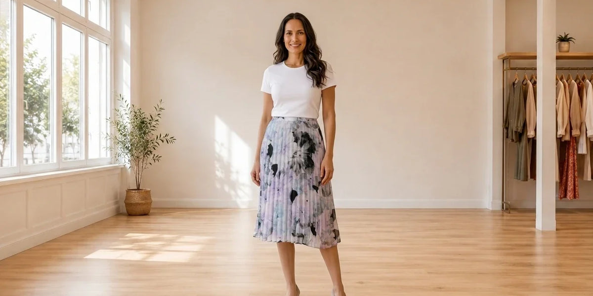 Model wearing Women's Petite Large Skirt Women's Petite Floral-Print Pleated Skirt in Online Warehouse Sale boutique studio