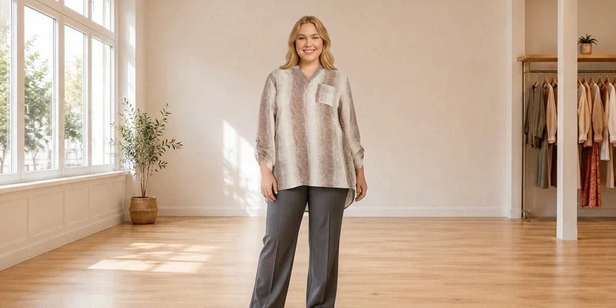 Model wearing Women's Plus 2X Shirts and Blouses Women's Plus High-Low Hem Tunic in Online Warehouse Sale boutique studio