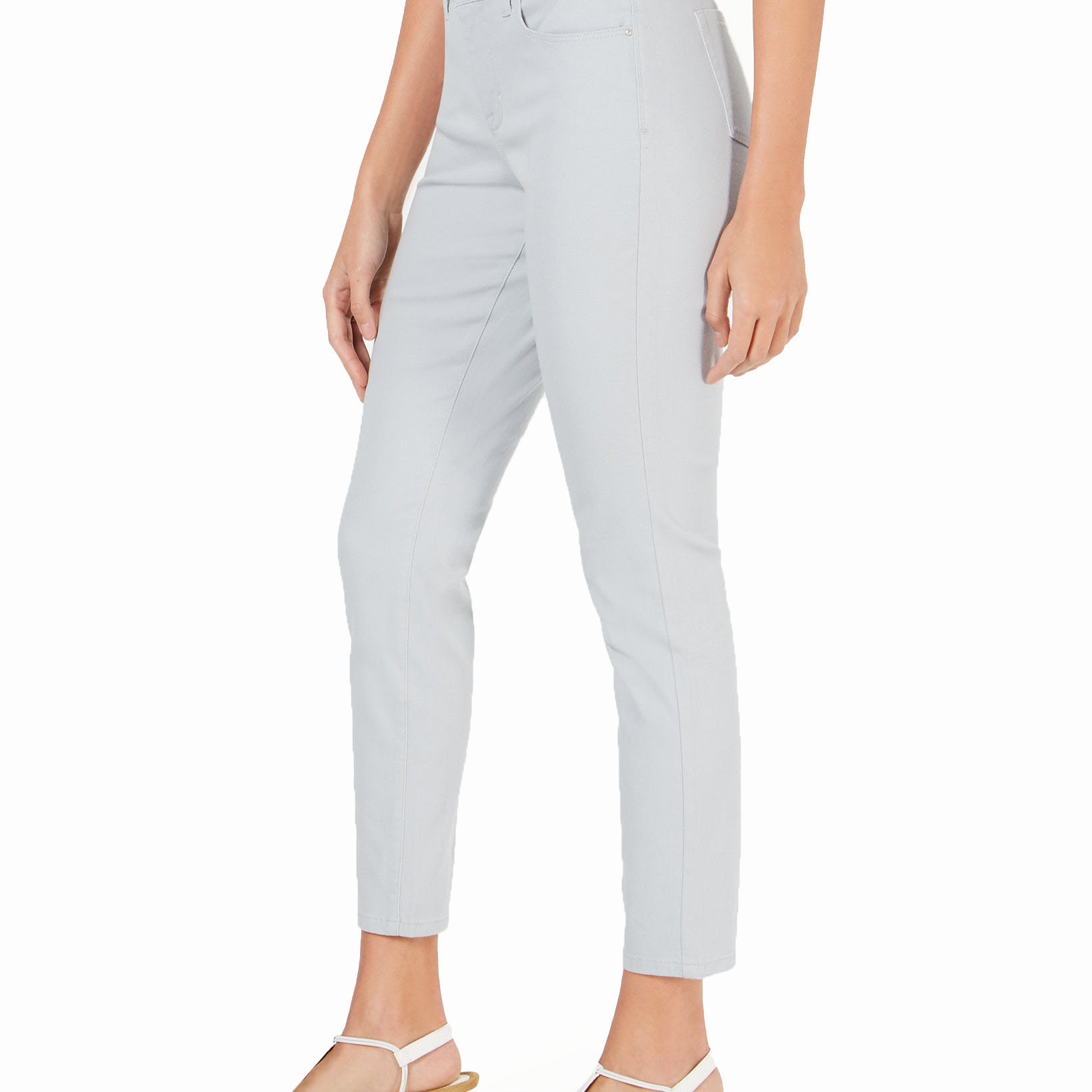 Light gray pants worn by a person on a white background