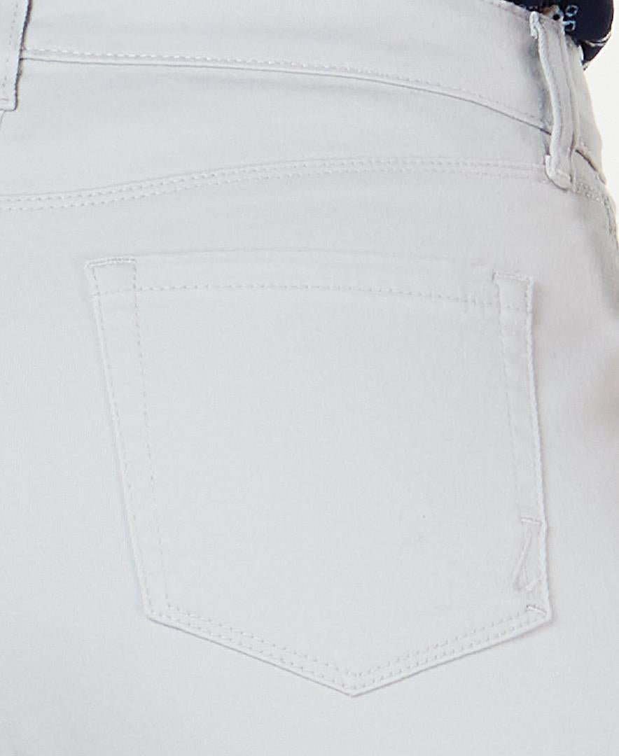 Close-up of light gray pants with a pocket detail on a white background