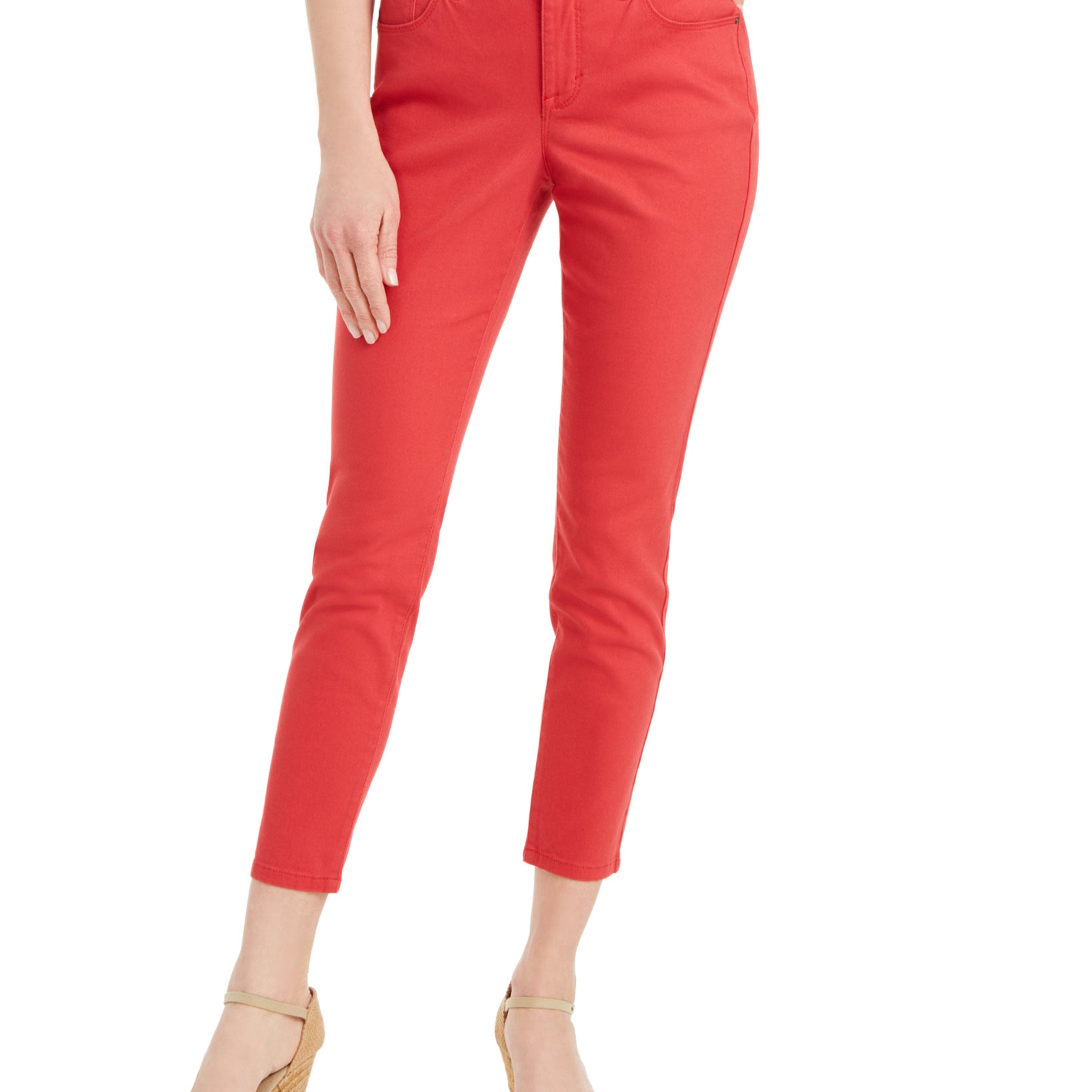 Red pants worn by a person on a white background