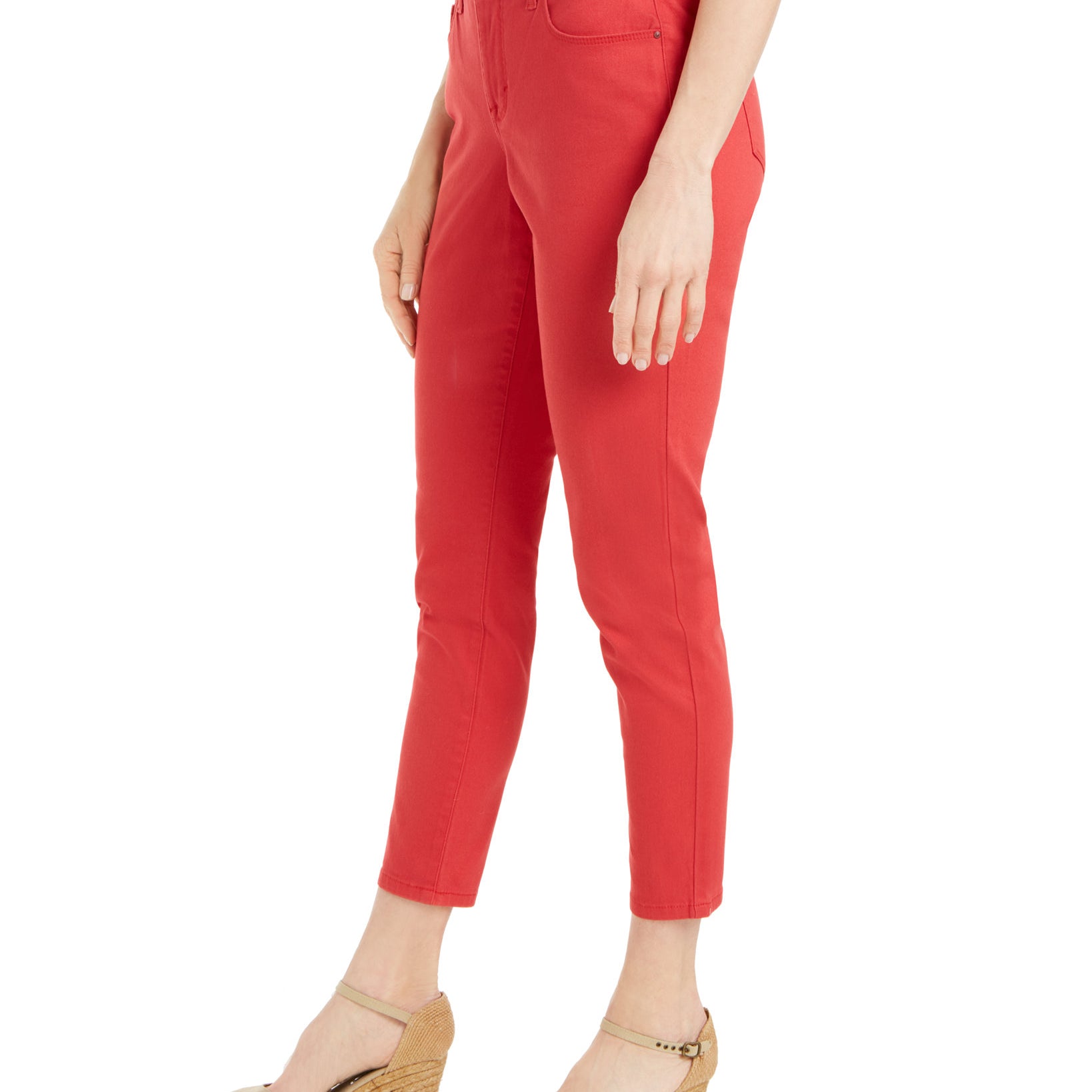 Red pants worn by a person on a white background