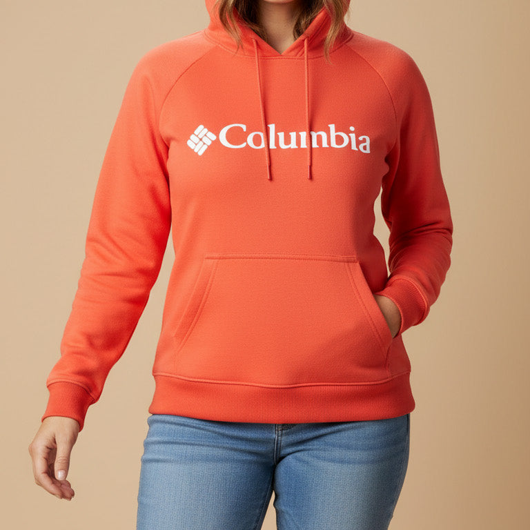 Person wearing a red Columbia hoodie on a beige background