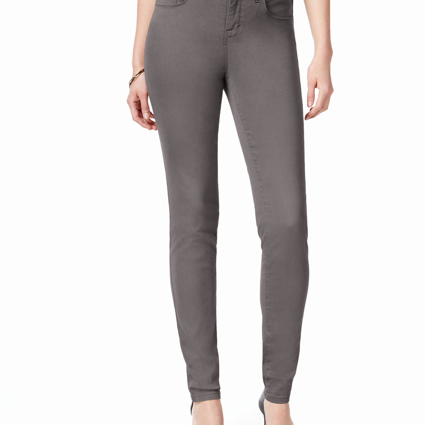 Gray pants worn by a person on a white background