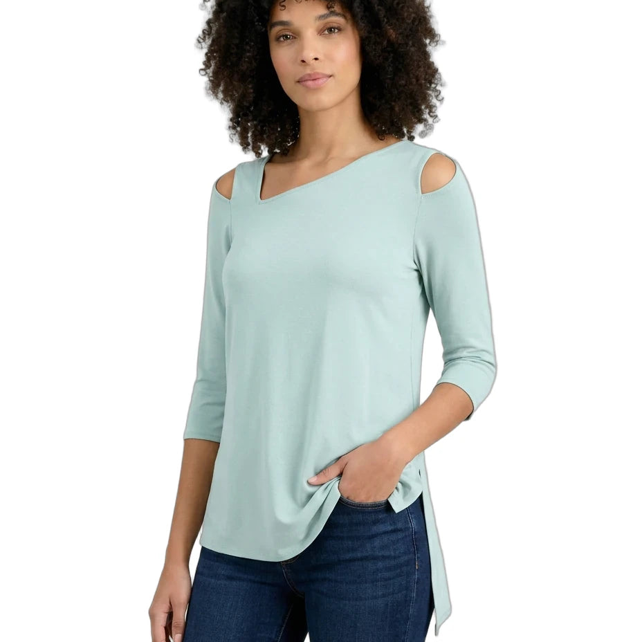 Woman wearing a light blue top with cold shoulder design on a white background