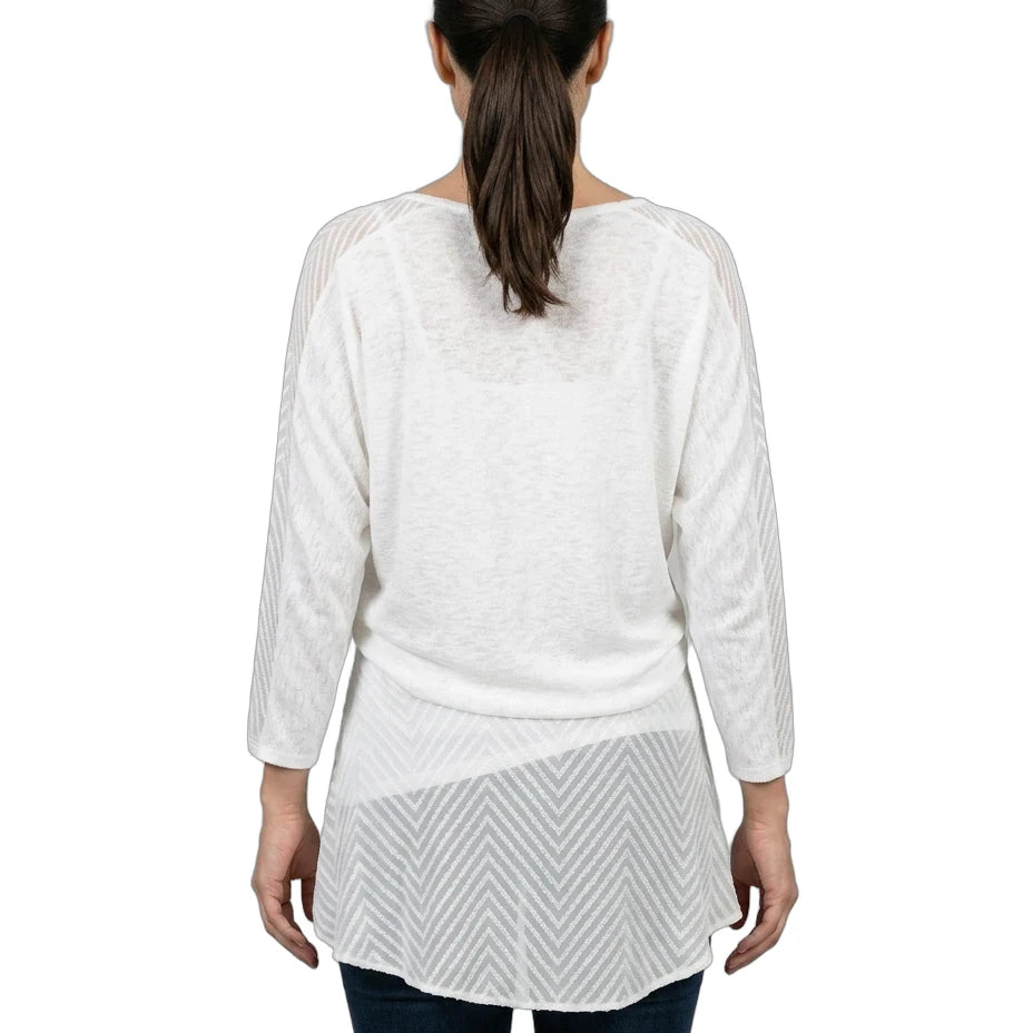 Woman wearing a white layered top on a white background