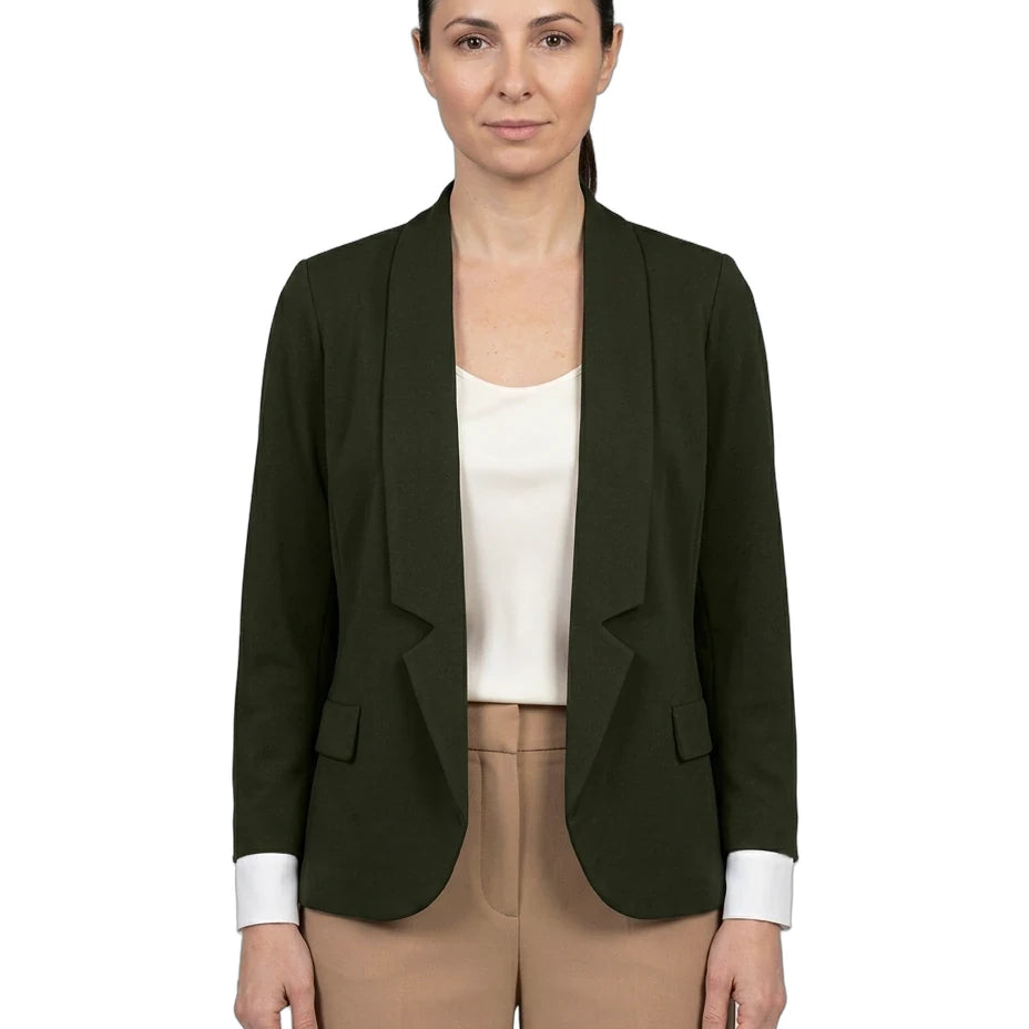 A woman modeling a dark olive green tailored blazer with shawl lapels, worn open over a cream top and tan trousers, against a plain white background.