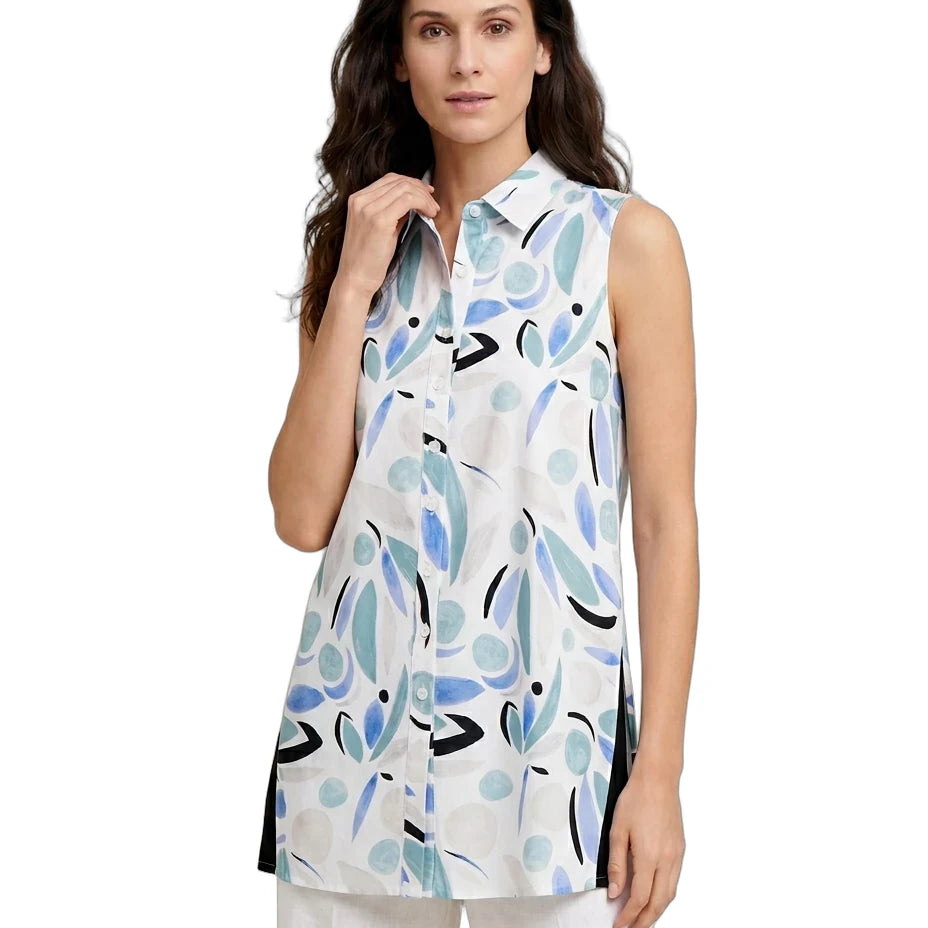 Woman wearing a sleeveless, patterned blouse with a white background