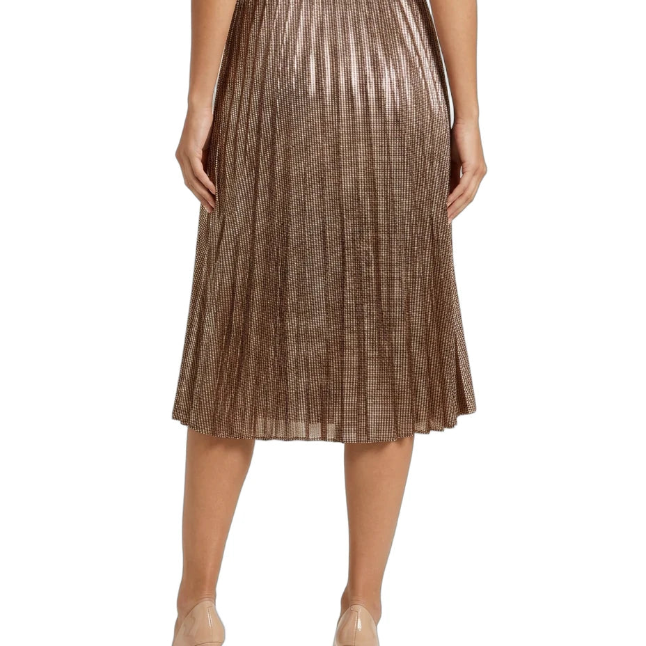 A metallic bronze pleated midi skirt with a black waistband, shown on a model from the waist down wearing beige high heels against a white background.