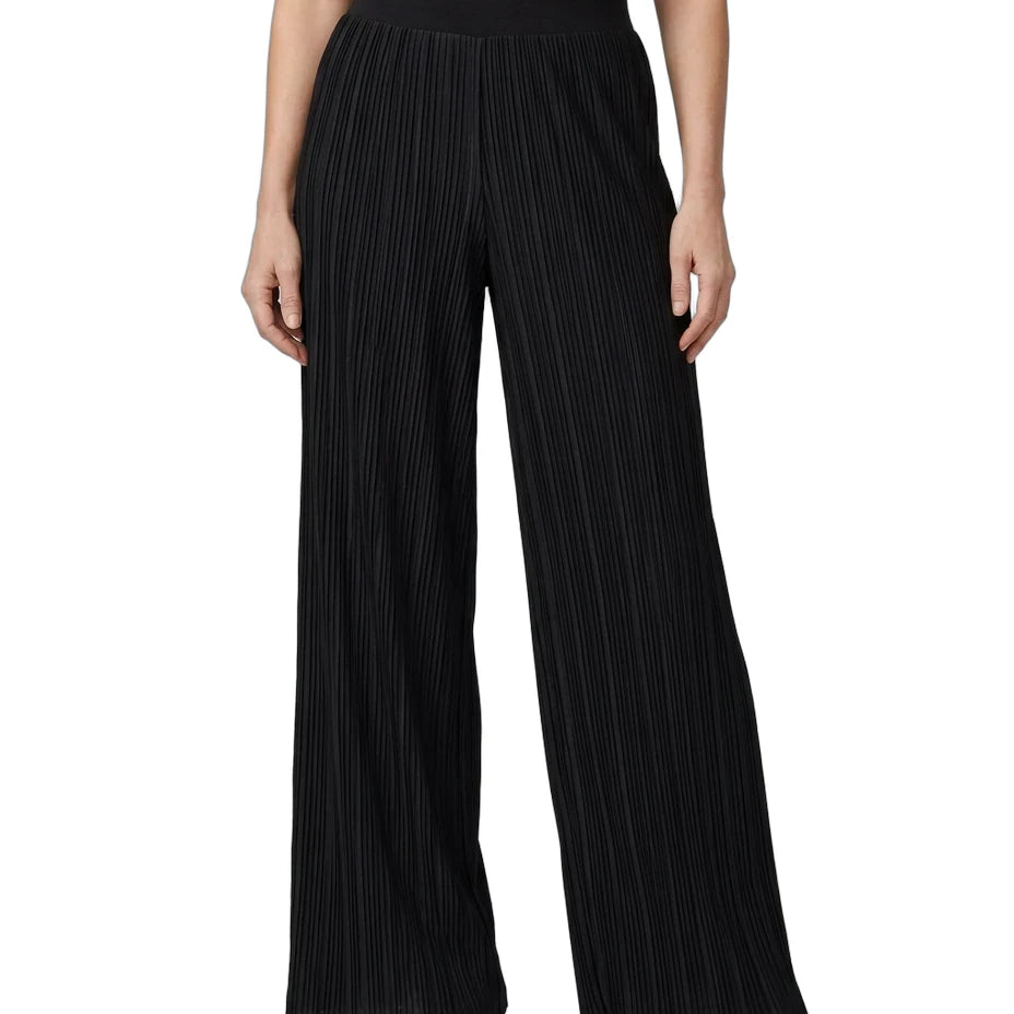 Black wide-leg pleated trousers with a black waistband, shown on a model wearing a cream top and silver sandals against a white background.