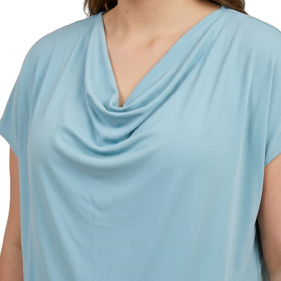 Light blue cowl-neck top worn by a person on a white background