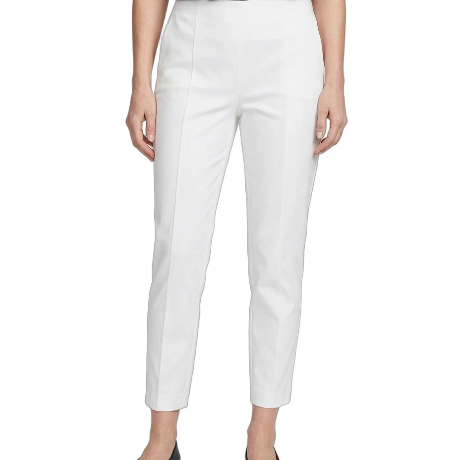 A model wearing white cropped trousers with a straight-leg fit, paired with a navy top and black flats, shown against a plain white background.