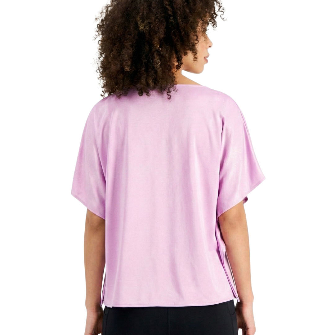 Person wearing a light purple t-shirt on a white background