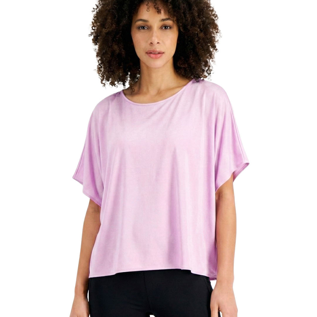 Woman wearing a light purple t-shirt on a white background