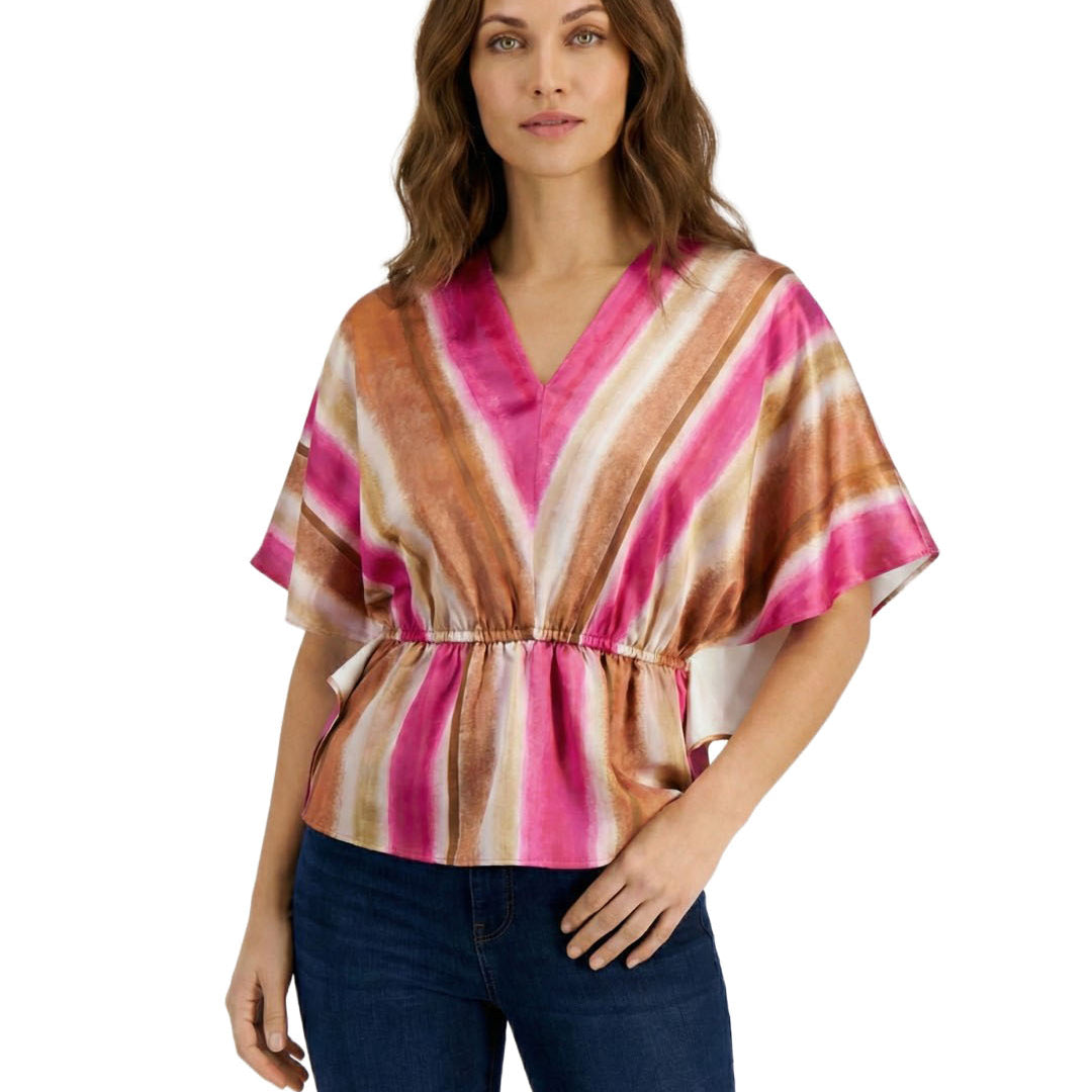 Woman wearing a colorful striped blouse on a white background