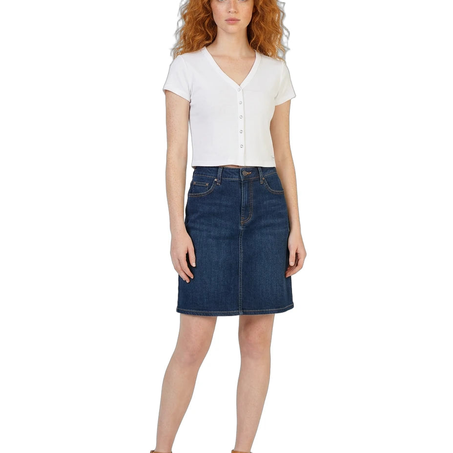 Woman wearing a white shirt and blue denim skirt on a white background
