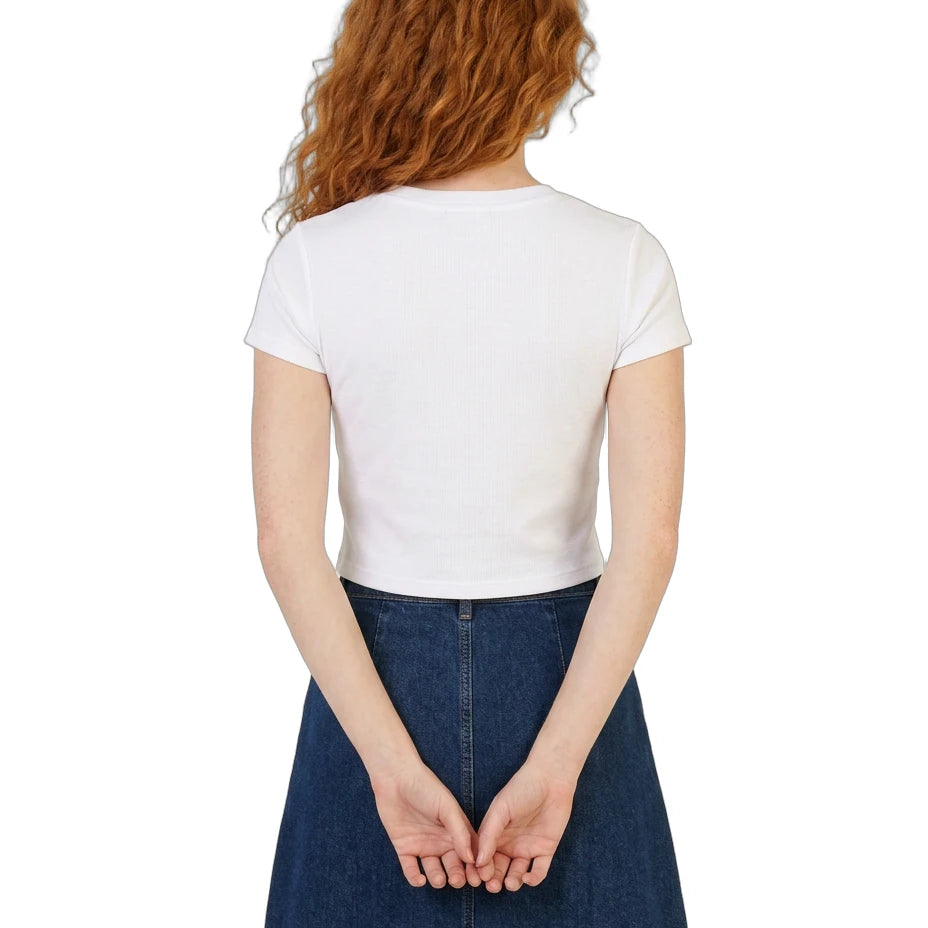 Person wearing a white t-shirt and blue denim skirt on a white background