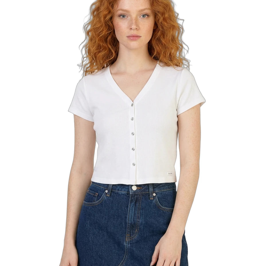Woman wearing a white short-sleeve blouse and blue jeans on a white background