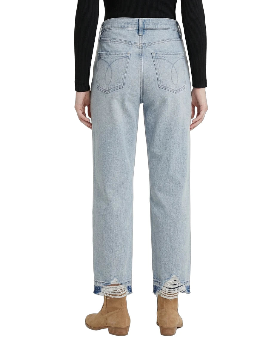 Light blue jeans worn by a person on a white background