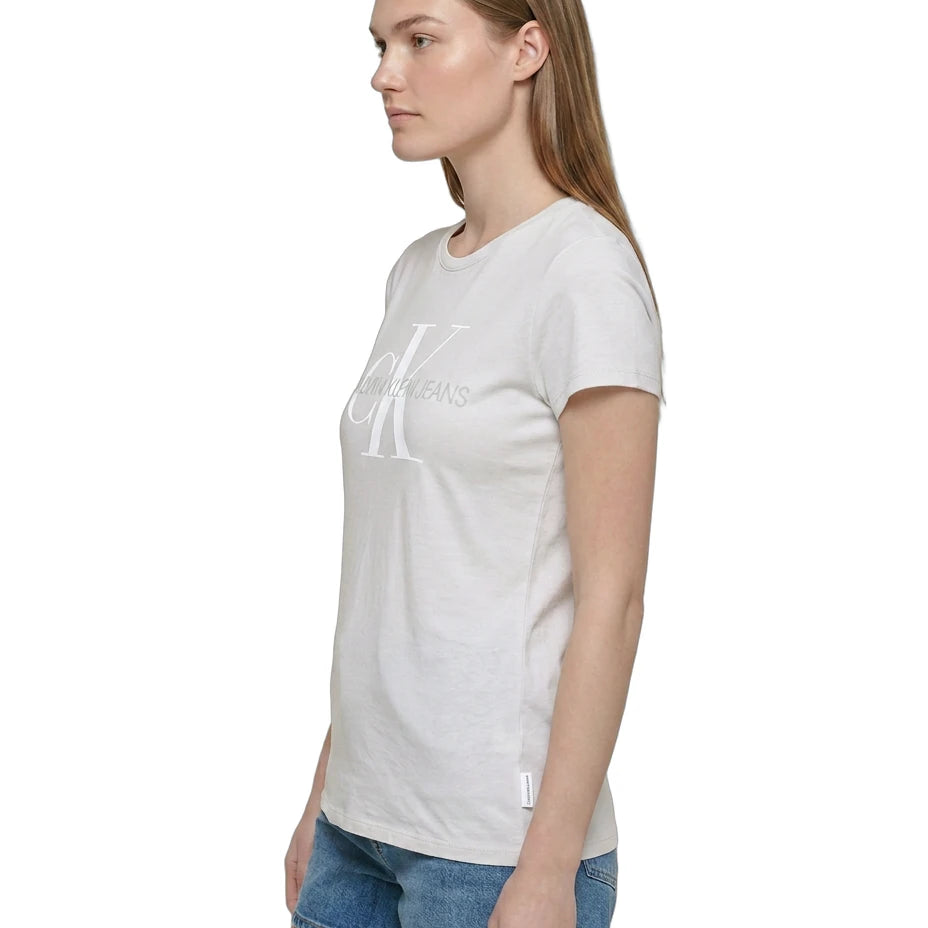 Woman wearing a white t-shirt with a logo on a white background