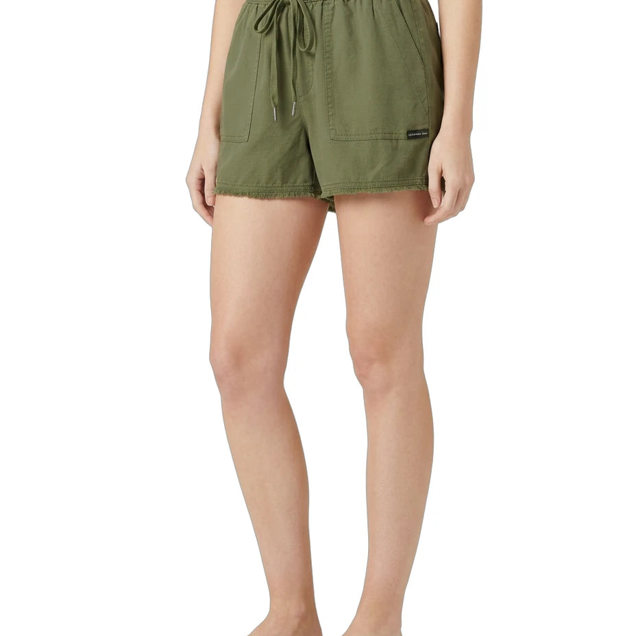 Person wearing green shorts on a white background