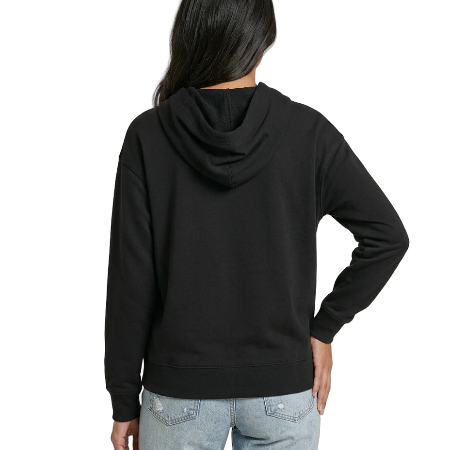 Woman wearing a black Calvin Klein hoodie with colorful text design on a white background seen from the back