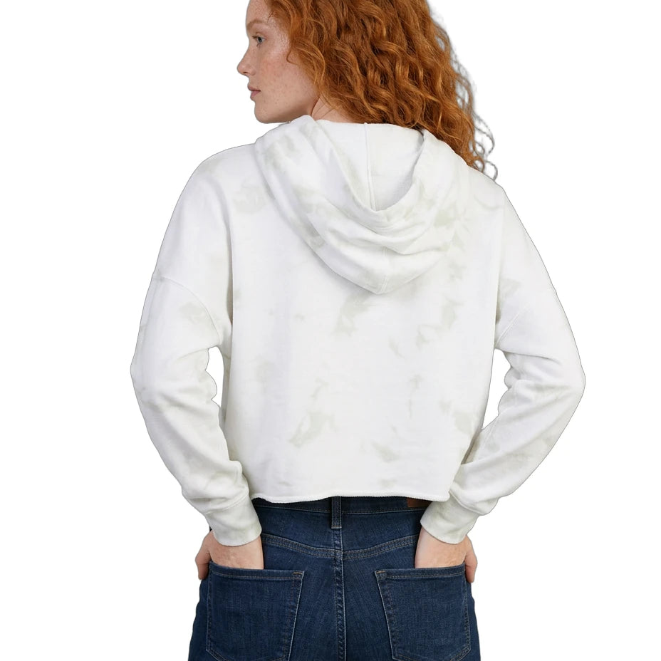 Person wearing a white Calvin Klein hoodie and blue jeans on a white background