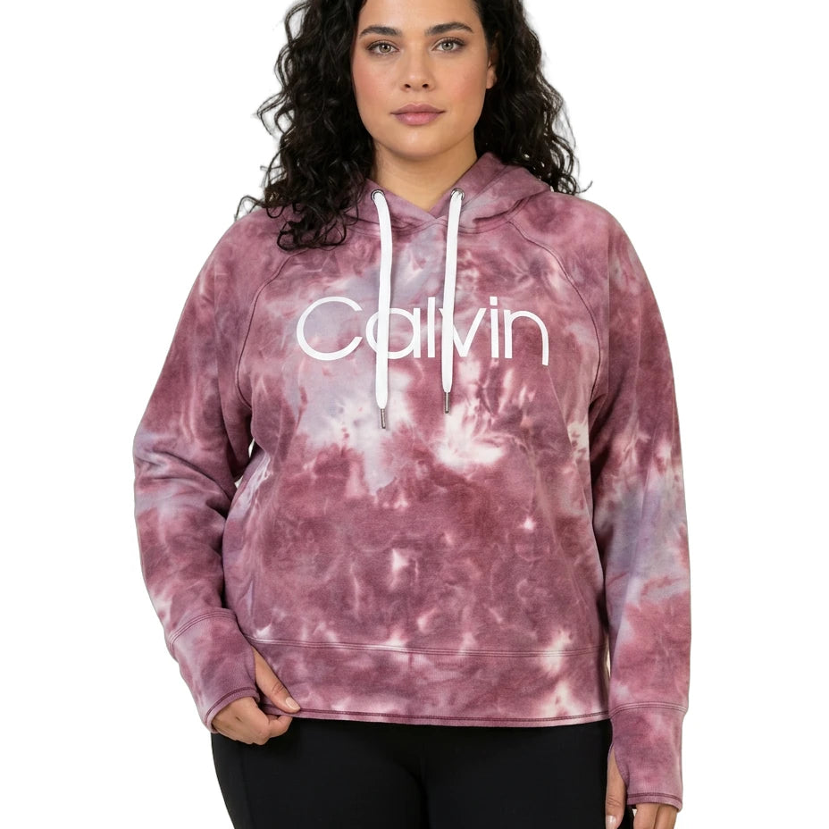 Person wearing a pink tie-dye hoodie with 'Calvin' logo on a white background