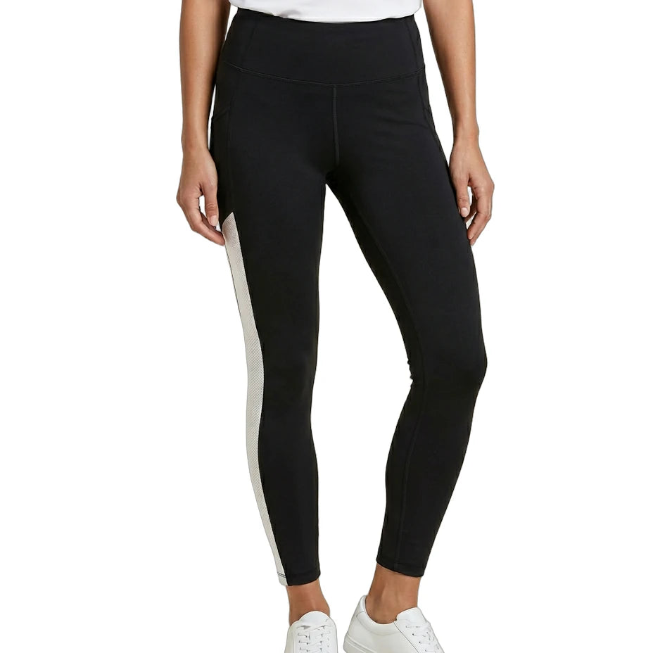 Person wearing black Calvin Klein leggings with a white stripe on a white background
