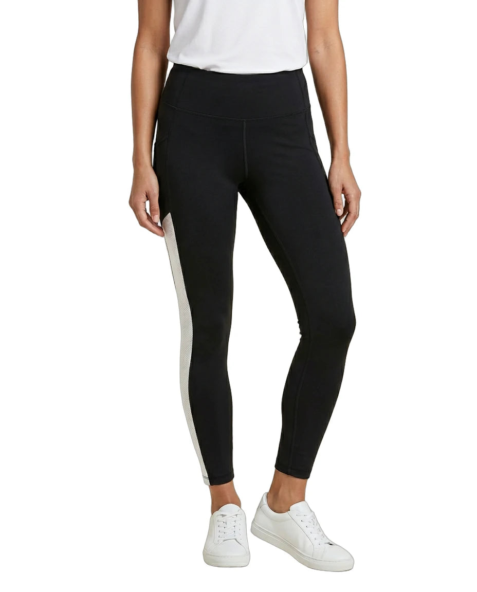 Person wearing black Calvin Klein leggings with a white stripe on a white background