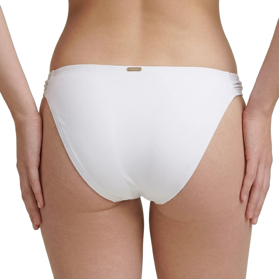 woman wearing Calvin Klein bikini bottoms on a white background