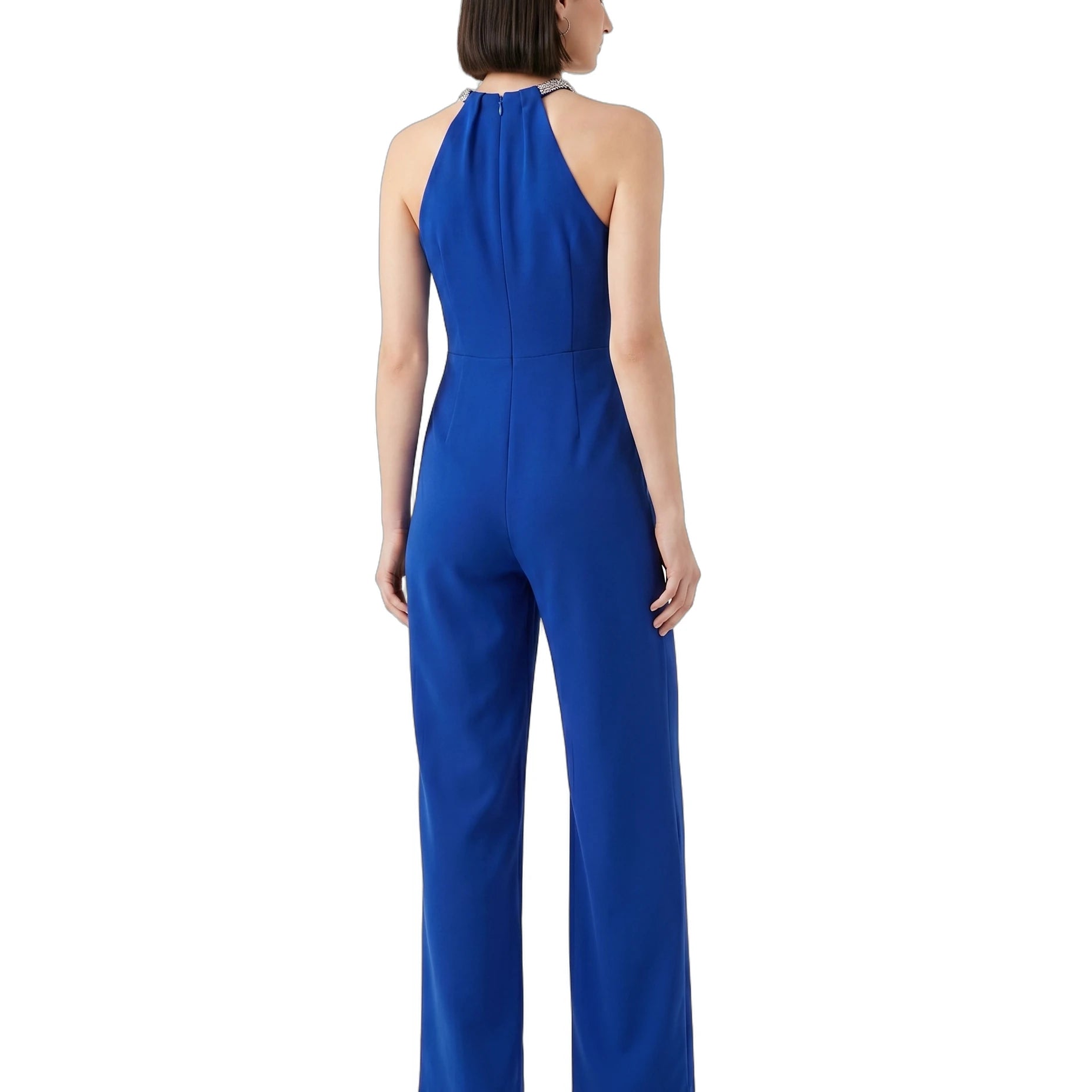 Woman wearing a blue jumpsuit on a white background