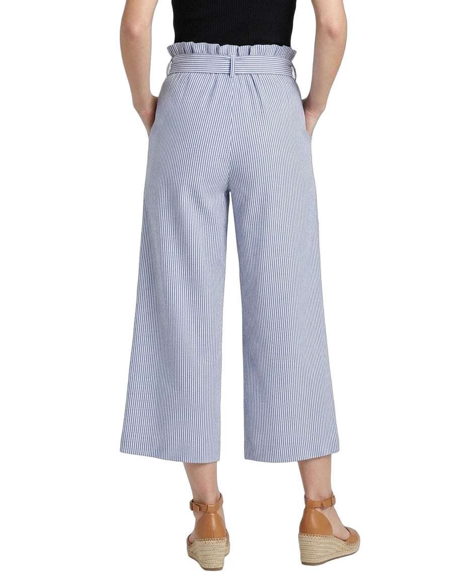 Light blue and white striped wide-leg pants worn by a person on a white background