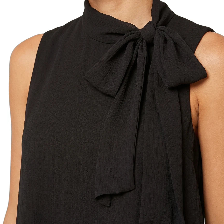 Black sleeveless top with a large bow detail on a white background