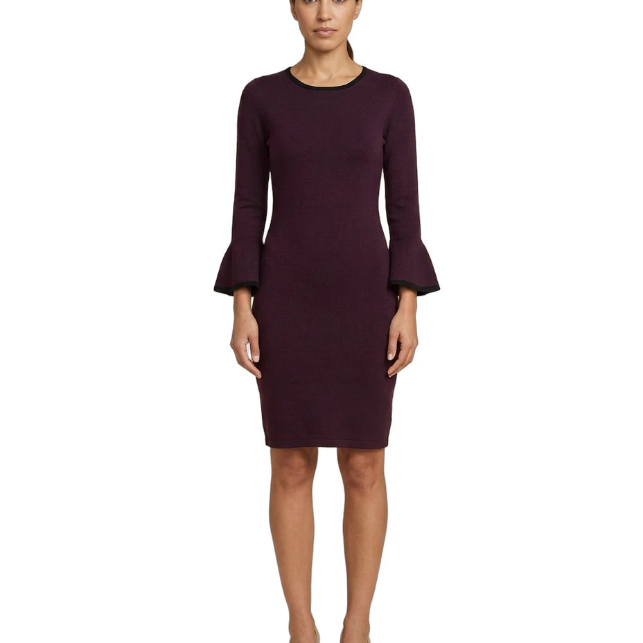 Woman wearing a dark purple dress with bell sleeves on a white background