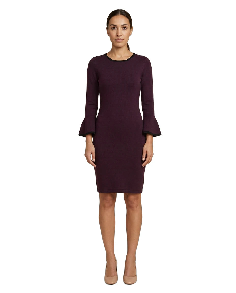Woman wearing a dark purple dress with bell sleeves on a white background