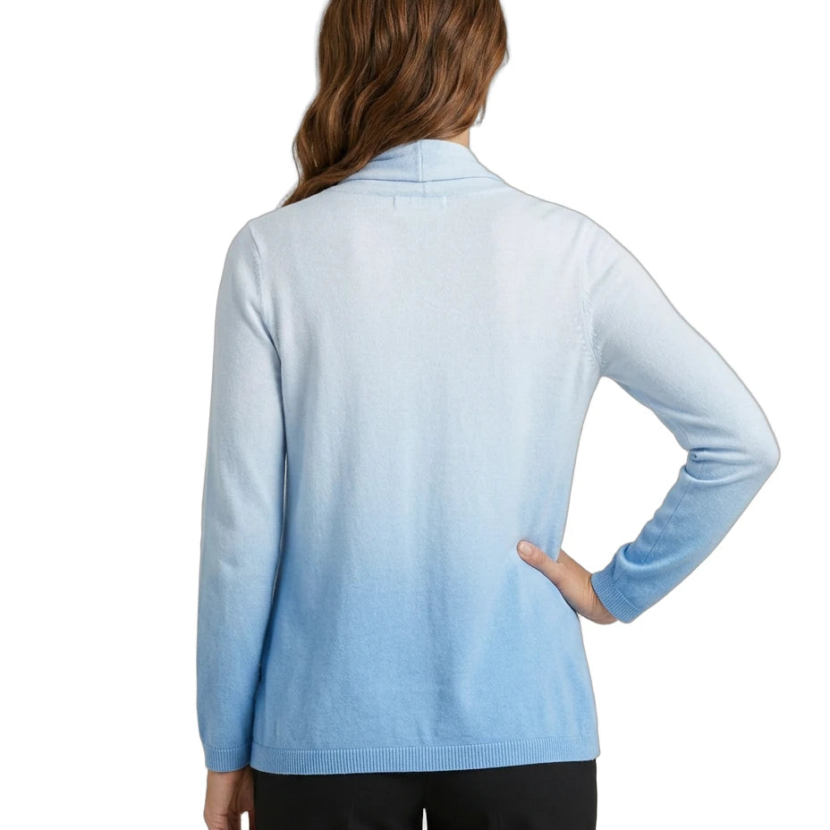 Woman wearing a light blue sweater on a white background