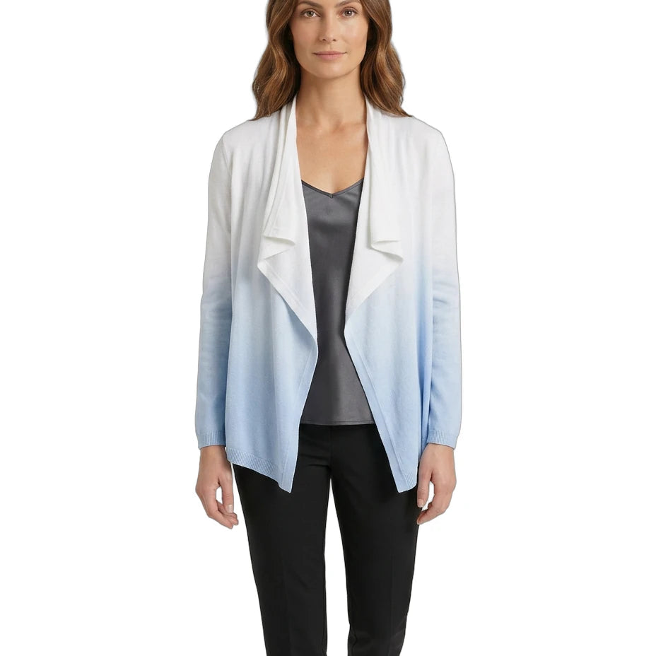 Woman wearing a light blue and white gradient cardigan on a white background