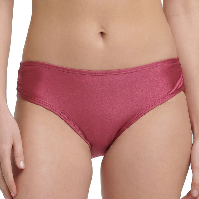 rose calvin klein bikini bottom worn by a person on a white background