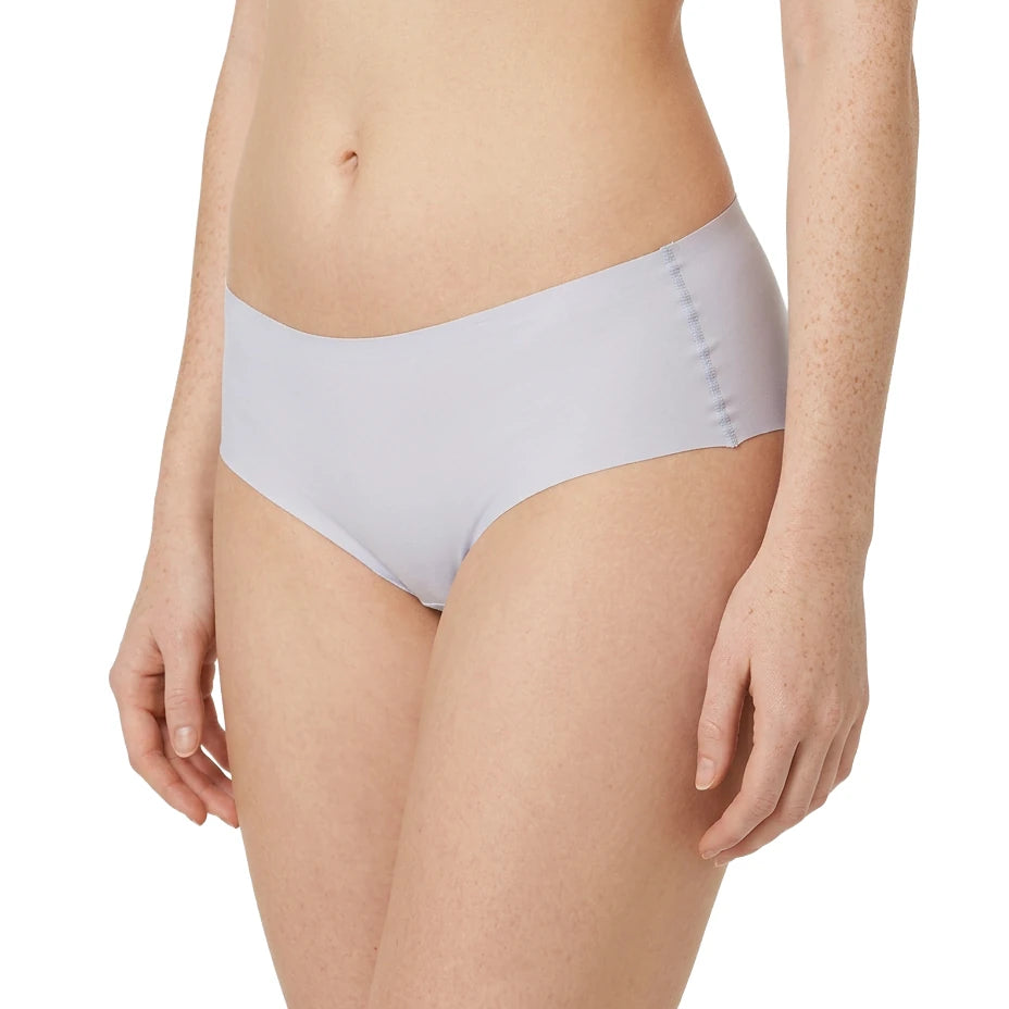 Light purple underwear worn by a person on a white background