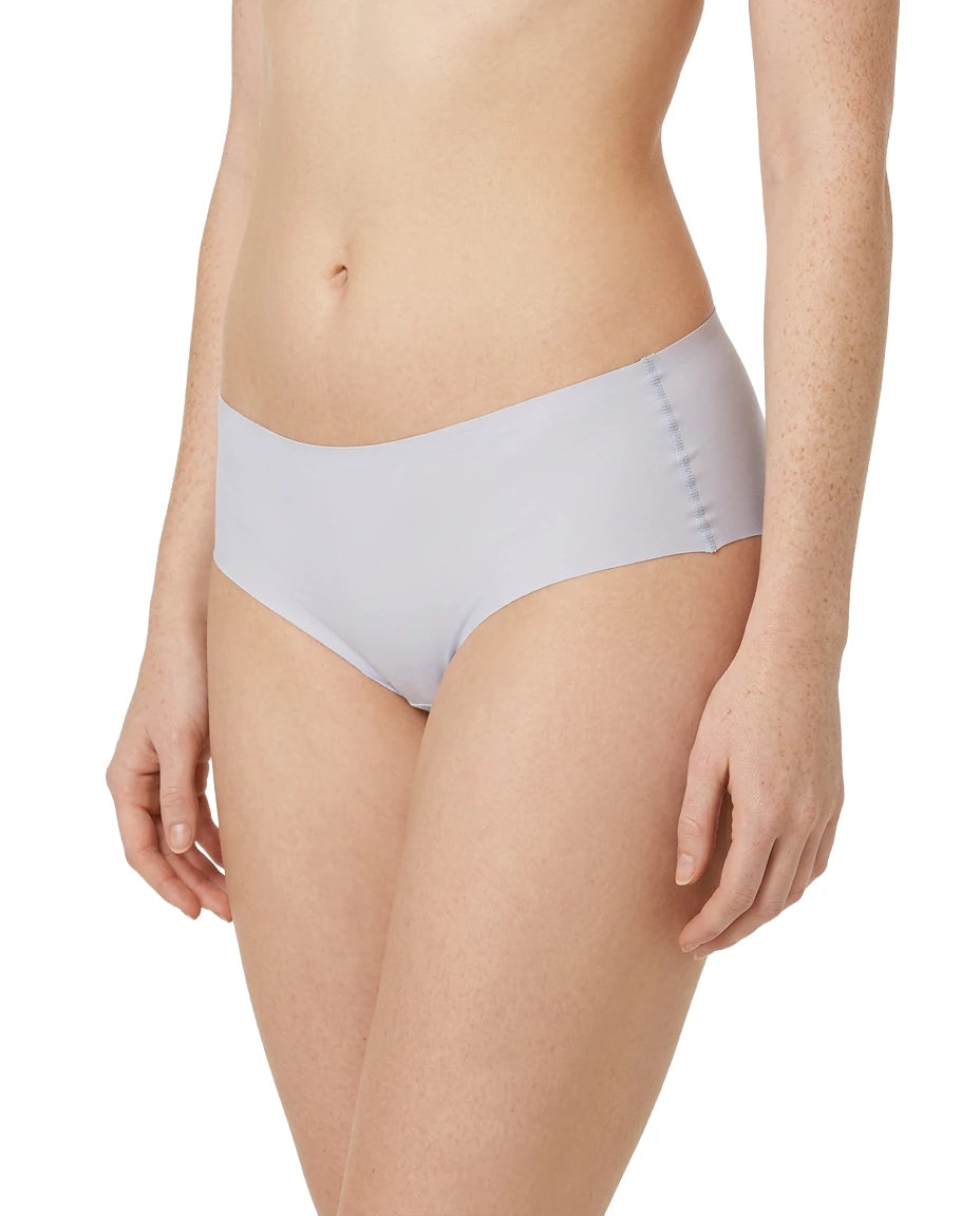 Light purple underwear worn by a person on a white background
