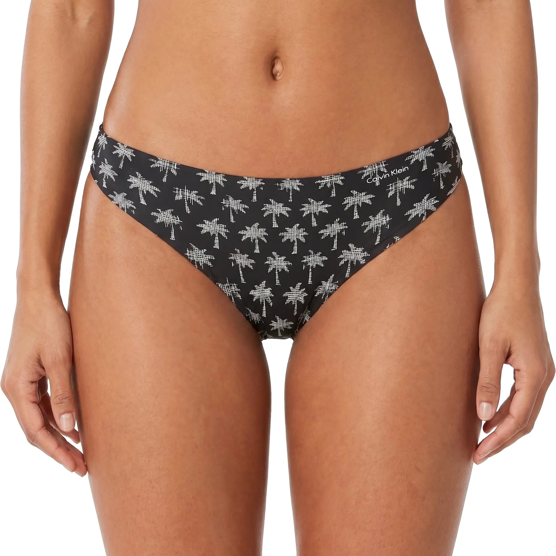 Black bikini bottom with palm tree pattern on a white background