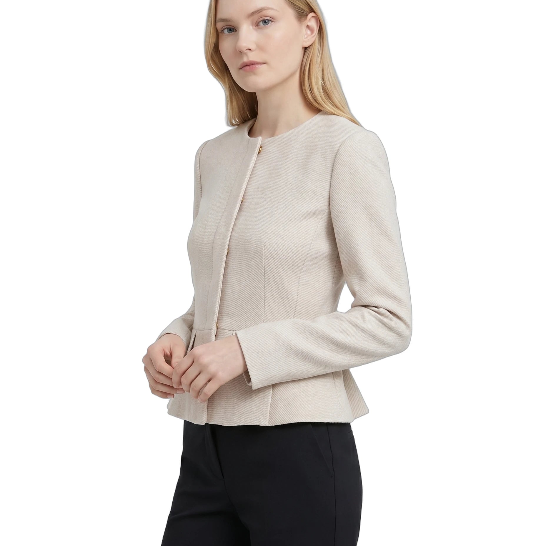Woman wearing a Calvin Klein beige blazer and black pants on a white background