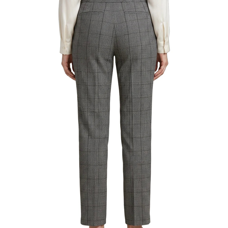 Gray Calvin Klein checkered pants worn by a person on a white background