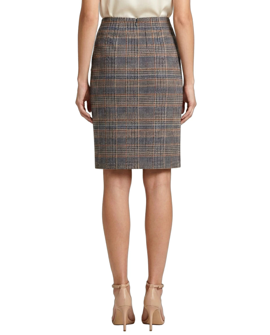 Calvin Klein plaid skirt worn by a person on a white background