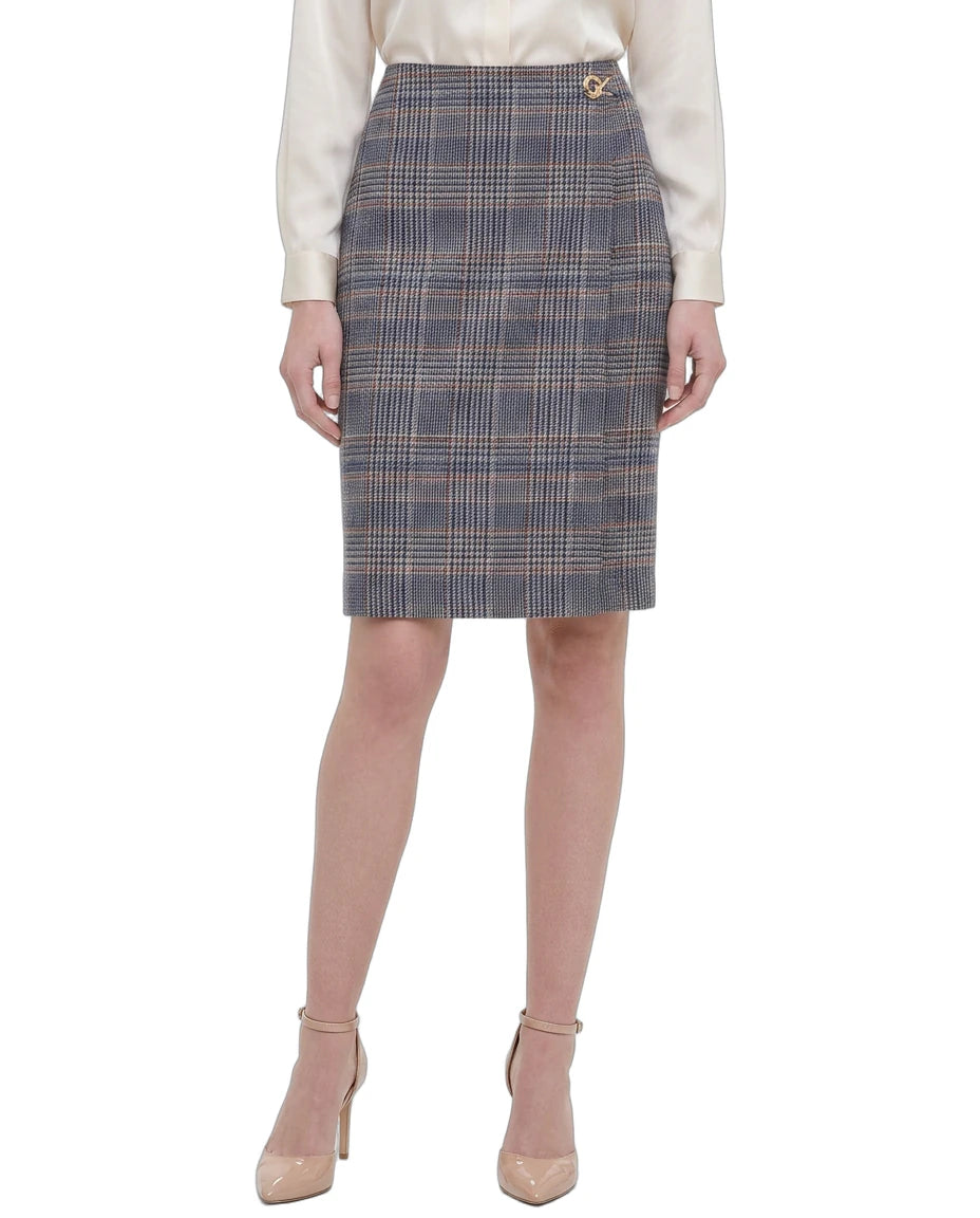 Calvin Klein plaid skirt worn by a person on a white background