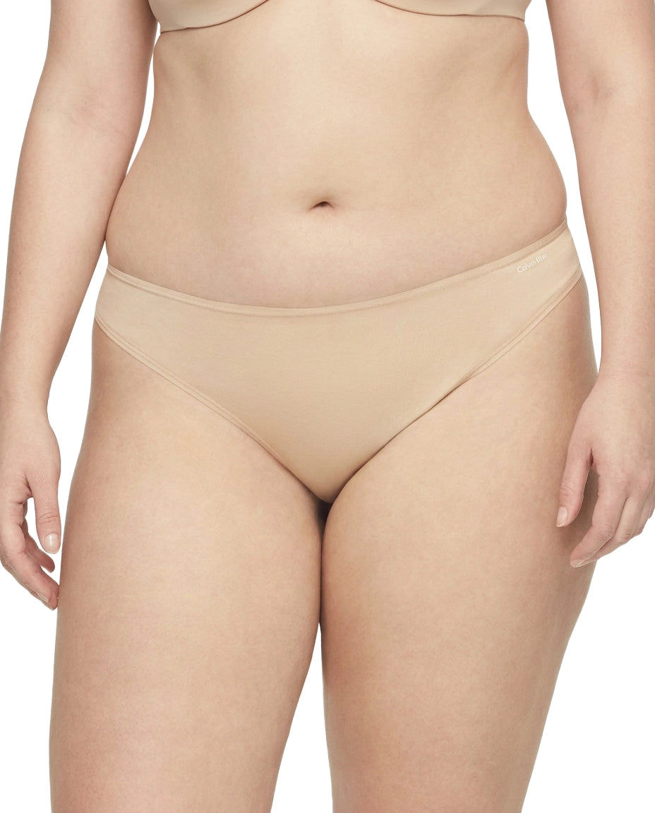 Beige underwear on a white background