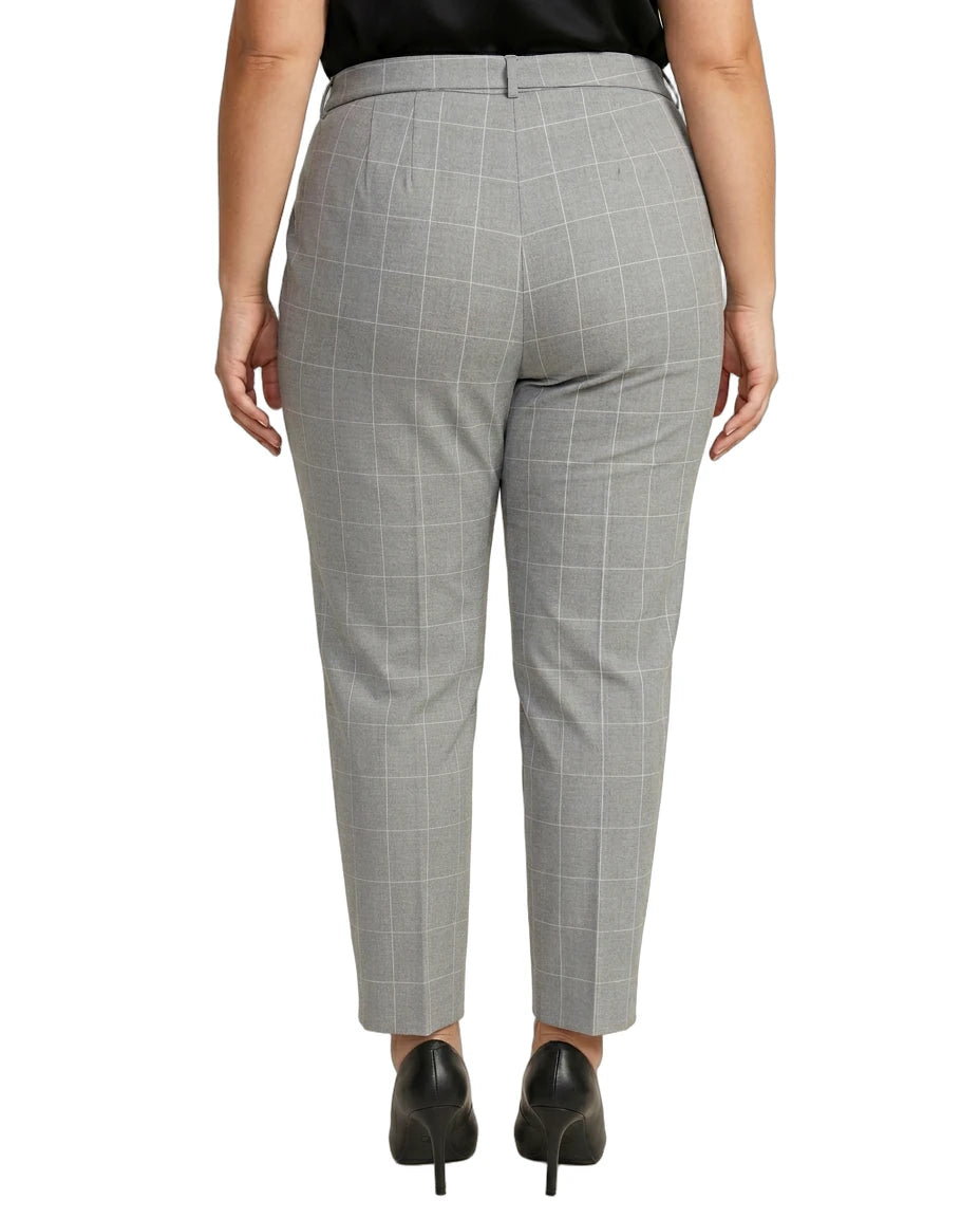 Calvin Klein gray checkered pants worn by a person on a white background