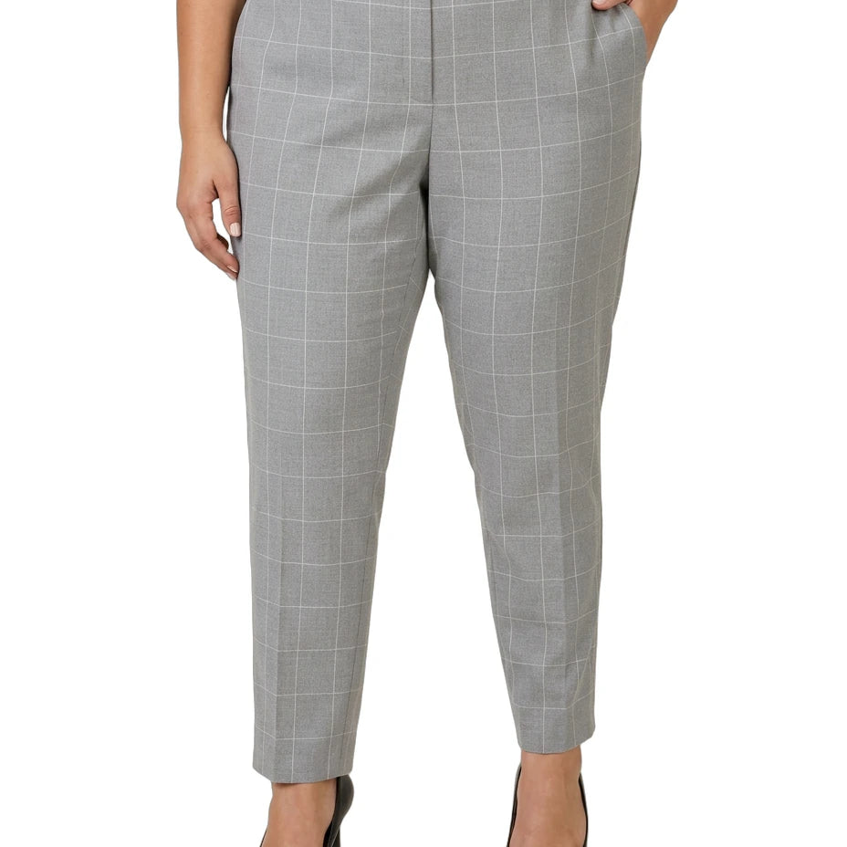 Calvin Klein gray checkered pants worn by a person on a white background