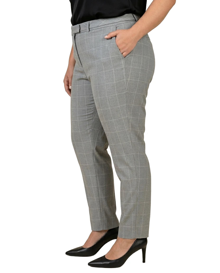 Calvin Klein gray checkered pants worn by a person on a white background